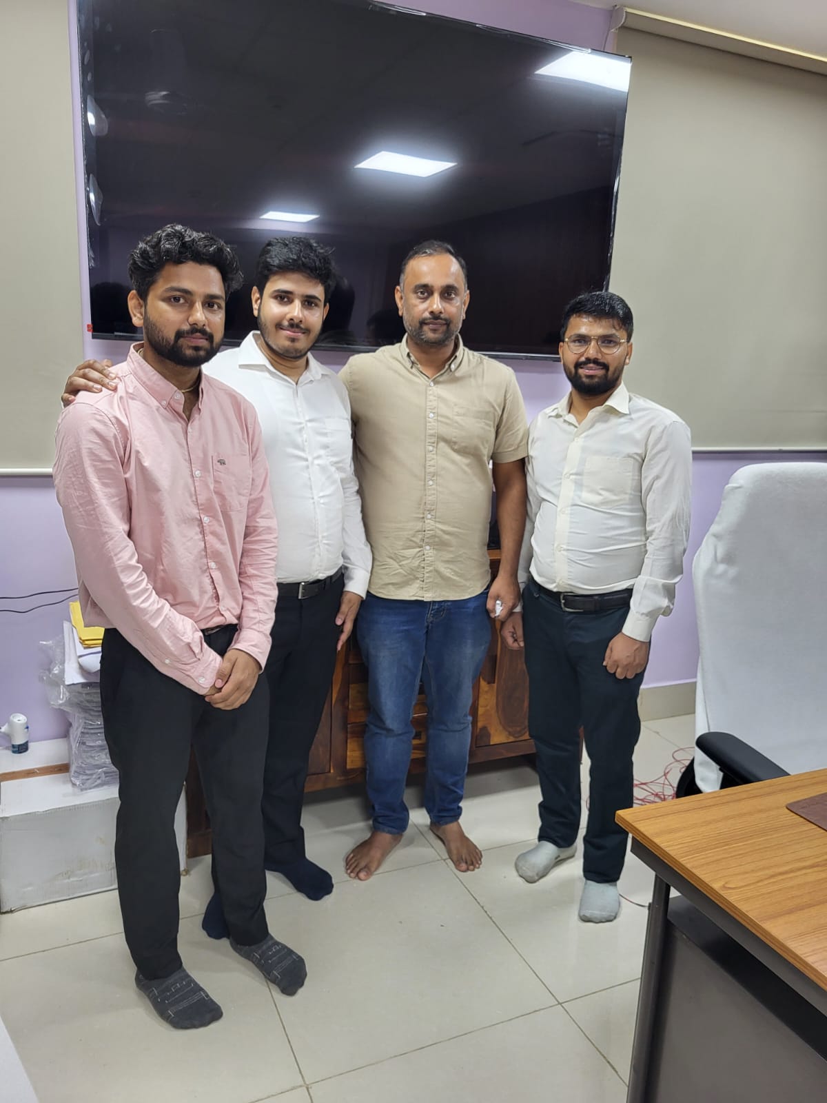 Lab members posing together in the IMPACT Lab office