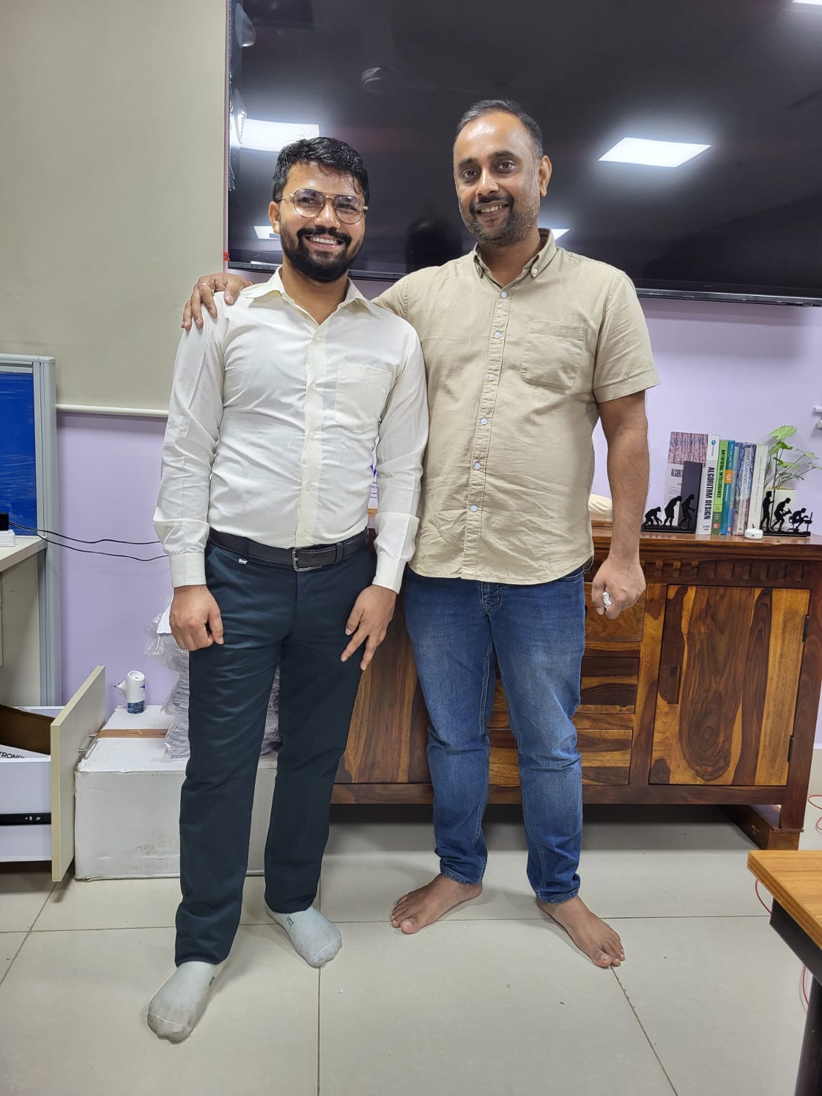 Dr. Rishav Singh with a lab researcher